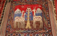 Lot 492 - An Afghan woollen 'war' pictorial rug,...