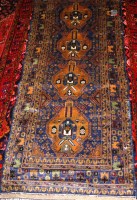 Lot 497 - A Persian Herat woollen runner, the deep blue...