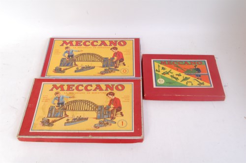 Lot 180 - Three French Meccano outfits, all restrung,...