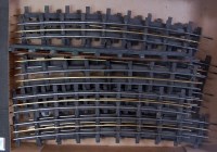 Lot 384 - 16x Milbro 3 rail steel track with brass...