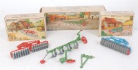 Lot 1230 - Three various boxed Britains Farm tractor...