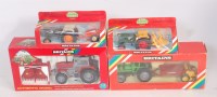 Lot 1294 - Four various rainbow boxed Britains tractor...