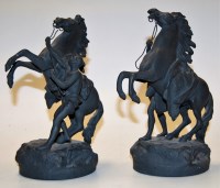 Lot 3 - A pair of modern spelter figures of rearing...