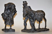 Lot 9 - A Ronald Moore bronzed resin figure of a man...