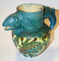 Lot 16 - A Lauder Barum Devon Pottery jug, the body...