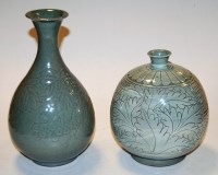Lot 18 - A Celadon glazed stoneware vase of onion shape...