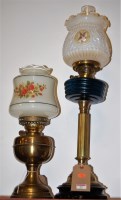 Lot 29 - A Victorian pedestal oil lamp having...