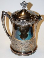 Lot 42 - A large Victorian silver plated hot water jug...