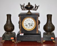 Lot 48 - A late Victorian black slate mantel clock...