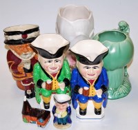 Lot 50 - A Crown Devon Beefeater character jug together...