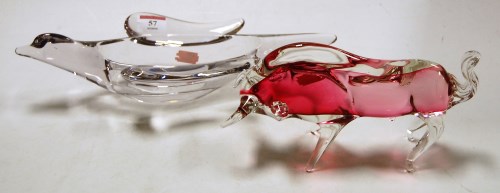 Lot 57 - A pink tinted and clear glass model of a bull...