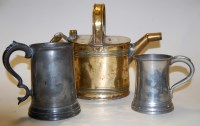 Lot 117 - A small brass watering can and two pewter...