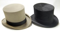 Lot 120 - An early 20th century black silk top hat...