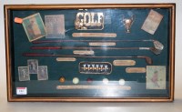 Lot 182 - A reproduction display of golf clubs and...