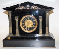 Lot 189 - A late Victorian black slate mantel clock of...