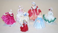 Lot 225 - A collection of seven Royal Doulton figurines,...