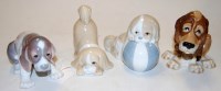 Lot 230 - A Lladro porcelain puppy; together with two...