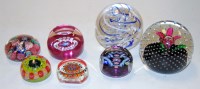 Lot 234 - A collection of modern glass paperweights, to...