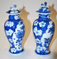 Lot 238 - A pair of Chinese export blue and white vases...