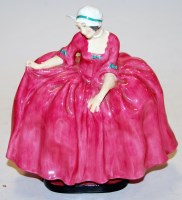 Lot 257 - A Royal Doulton figurine of Polly Peachum from...