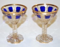 Lot 268 - A pair of Bohemian glass pedestal liqueurs,...