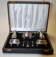 Lot 301 - A cased sterling silver five piece cruet set,...