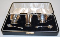 Lot 306 - A cased silver three piece cruet set, by Adie...
