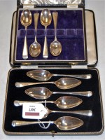 Lot 307 - A cased set of six silver grapefruit spoons;...