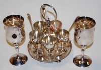 Lot 315 - A silver plated five cup egg cruet; together...