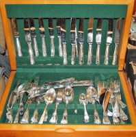 Lot 320 - A modern teak cased cutlery canteen and...