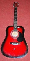 Lot 327 - A Falcon acoustic guitar, model No.FG100R,...