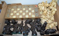 Lot 328 - A modern resin chess set, each piece in the...