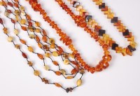 Lot 404 - Three amber necklaces