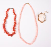 Lot 413 - A coral bead necklace, 42cm, a brach coral...