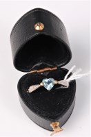 Lot 426 - A 9ct heart shaped topaz and diamond ring, the...