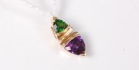 Lot 428 - An amethyst and diopside pendant, 17mm long,...