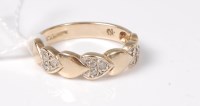 Lot 439 - A 9ct diamond ring, half the band set with...