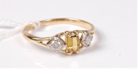 Lot 445 - An 18ct yellow hardstone and diamond ring, the...