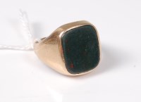 Lot 455 - A gentleman's 9ct bloodstone ring, the squared...