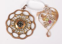 Lot 474 - An Art Nouveau style pendant, set with seed...