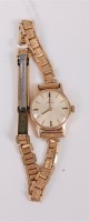 Lot 480 - A lady's 9ct Omega wristwatch, the round dial...