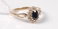 Lot 485 - A ladies 9ct yellow gold, sapphire and diamond...