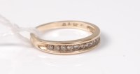 Lot 497 - A 9ct half hoop eternity ring, the small round...