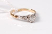 Lot 502 - An 18ct and platinum diamond ring, the round...