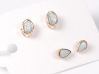 Lot 519 - A pair of oval aquamarine earstuds, 6.8mm long,...