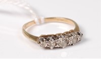 Lot 528 - A five stone diamond ring, the graduated round...