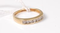 Lot 531 - An 18ct half hoop diamond ring, the small...