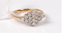 Lot 534 - A diamond cluster ring, the diamond shaped...