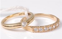 Lot 547 - Two 14ct CZ rings, a single stone CZ ring,...