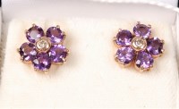 Lot 556 - A pair of 9ct amethyst and diamond cluster...